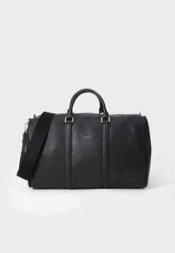 Calvin Klein RAISED LOGO - Weekend Bag - Black