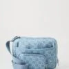 Jordan MONOGRAM SLING BAG - Cross Body Bag - Bleached Denim